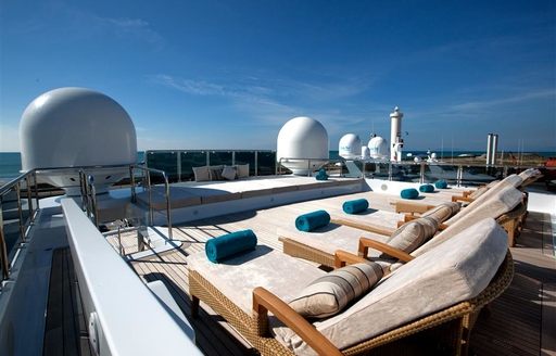 line up of sun loungers on sundeck of luxury yacht Double Down