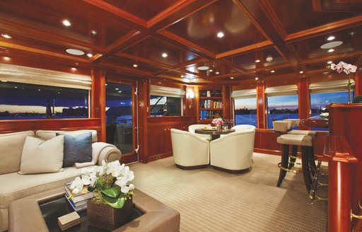 seating and bar in the upper salon on board charter yacht Milk and Honey 