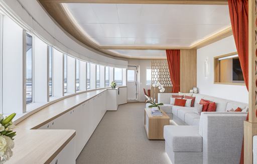 Interior lounge area with extensive glazing onboard charter yacht WAYFINDER