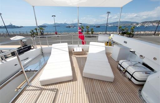 sun loungers on the flybridge of luxury yacht Tuscan Sun