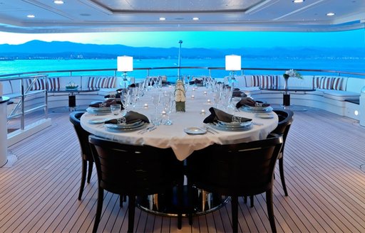 Alfrecso dining table onboard charter yacht LATITUDE