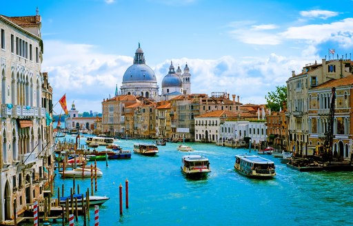 Waterways in the Italian city of Venice, with old buildings either side of the water