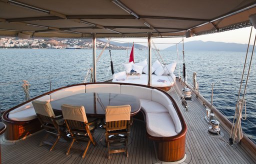 dining and sunning station on aft deck of charter yacht REGINA 
