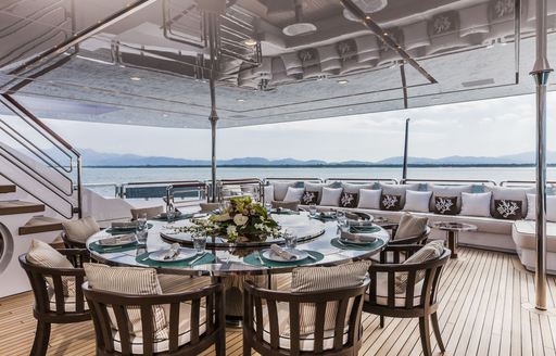 alfresco dining on upper deck aft of superyacht ‘Polaris I’ 