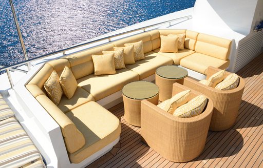 Sun pads and some seating on the exterior of luxury yacht Lady Sheridan
