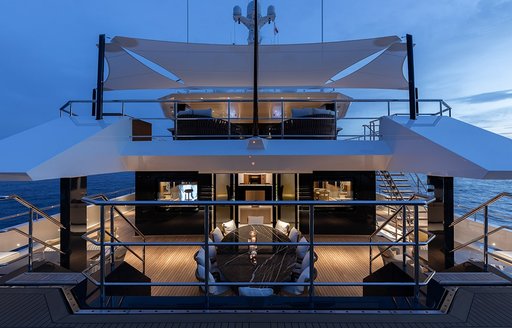 Overview of the aft decks onboard charter yacht LA DATCHA at night