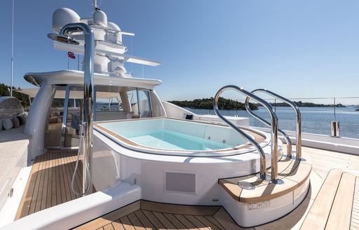 Overview of the on-deck Jacuzzi onboard charter yacht AMIGOS