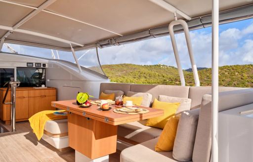 Alfresco dining option on the aft deck onboard charter yacht GUILLEMOT