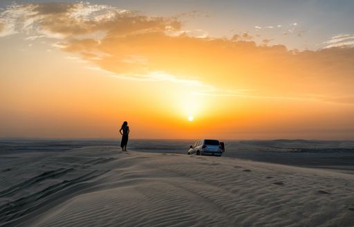 Beautiful sunset over sand dunes in Qatar