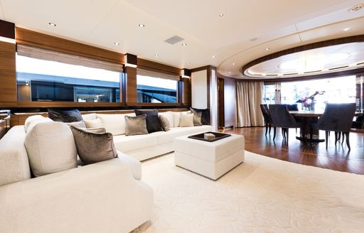 sumptuous L-shaped sofa in main salon of motor yacht ‘Silver Wind’ 