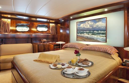 classically styled master suite on motor yacht ‘Cento by Excalibur’ 