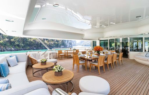 outdoor dining onboard luxury superyacht charter Lady E