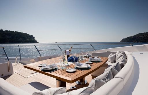 An alfresco dining option on the sundeck of luxury yacht THUMPER