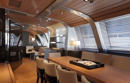 long dining table in the main salon aboard charter yacht SEAHAWK 