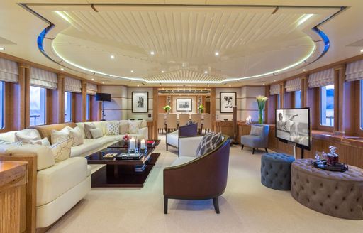 Art Deco-themed interior of main salon on board luxury yacht ‘QM of London’ 