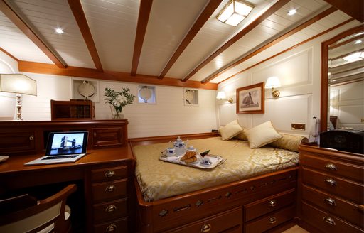 master suite with large desk on board charter yacht ELENA