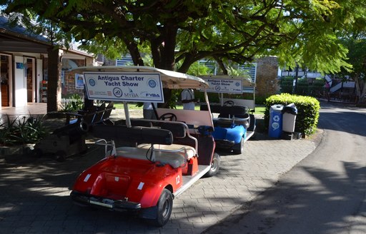 golf buggies prepare for shuttle rides at the 2016 Antigua Charter Yacht Show 