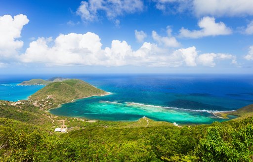view of the verdant landscape and blue waters of Virgin Gorda in the British Virgin Islands