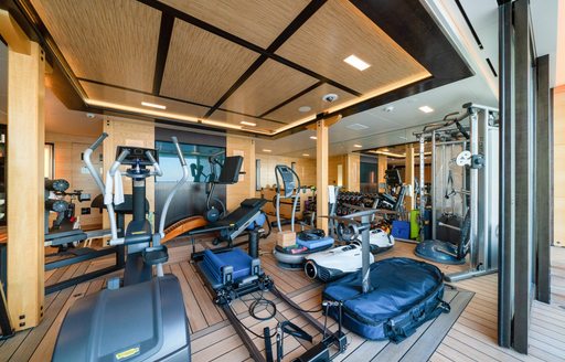 Gym located in the beach club on board charter yacht AMARYLLIS