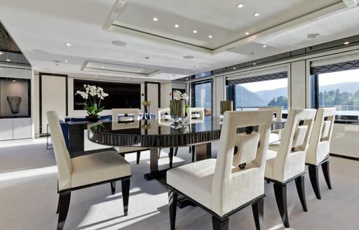 Formal dining area onboard charter yacht AMIGOS