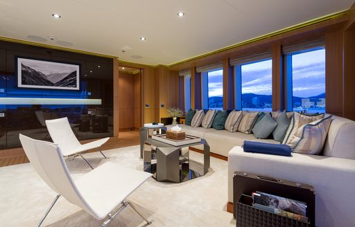 comfortable sofa and TV in skylounge of superyacht GO