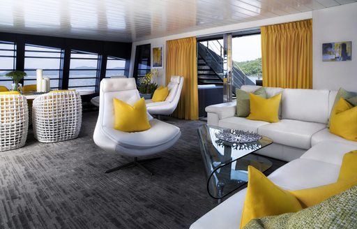The white and yellow furnishings found inside of luxury yacht 'Ocean Emerald'