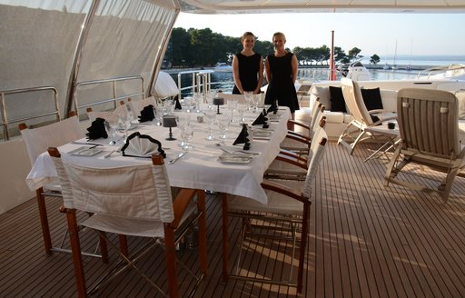 alfresco dining on the upper deck of charter yacht SALU 