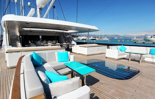 comfortable seating on spacious seating on upper deck aft of charter yacht AQUIJO 