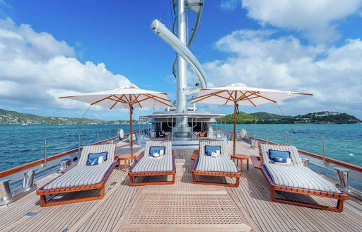 Four sun loungers on the deck onboard sailing yacht charter MALTESE FALCON