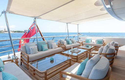 Luxury charter yacht La Mirage seating area on the aft
