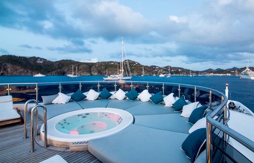 Luxury yacht O'Mega jacuzzi and sunpads