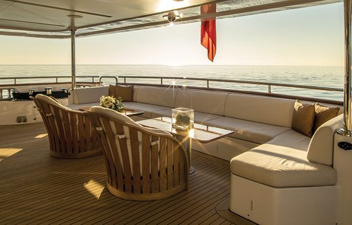 Soy Amor yacht sofa seating and wooden chairs