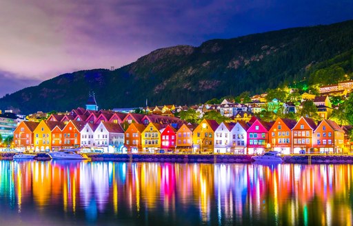 The colorful houses of Bergen lit up at night along the waterfront