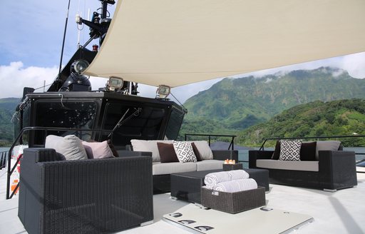 Alfresco lounging area with awnings on deck of luxury support vessel Ad-Vantage