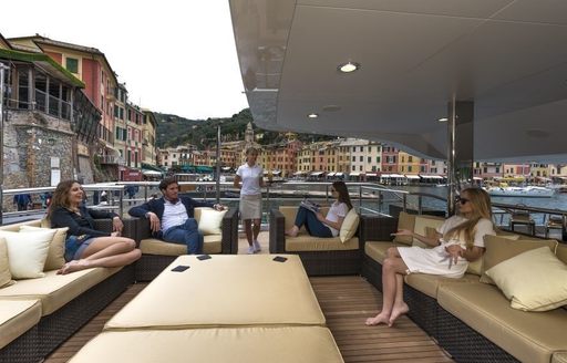 guests enjoying a cruise down portofino as part of their luxury yacht characterisation 