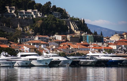 Yachts sat in front of the quaint town of Nafplion, Greece