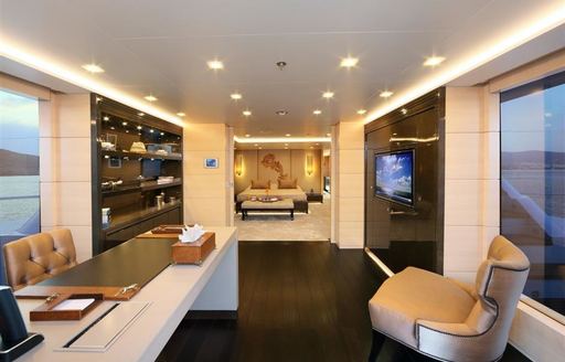 office with full-length windows in master suite on board charter yacht ‘Rima II’ 