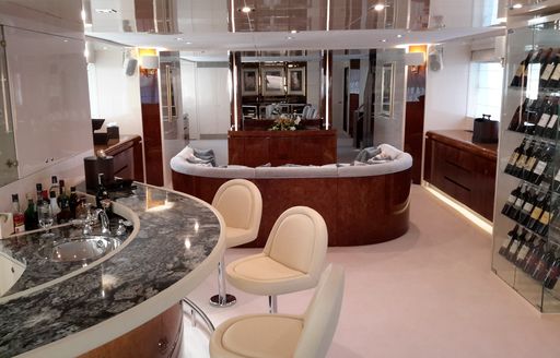 bar and lounge area in main salon of charter yacht LADYSHIP 