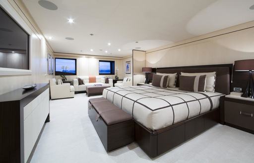 master suite with timeless styling on board charter yacht 4YOU