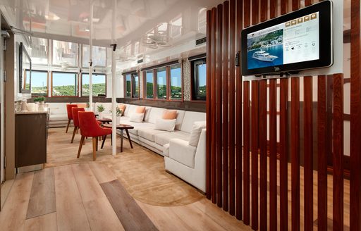 Interior seating area onboard private yacht charter QUEEN ELEGANZA