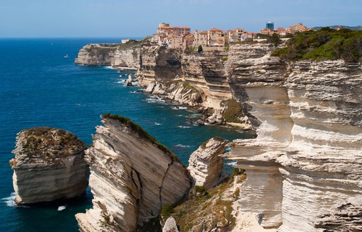 the limestone cliffs and blue waters of Bonifacio, Corsica