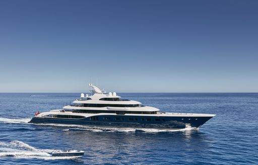 Running shot of luxury yacht SYMPHONY
