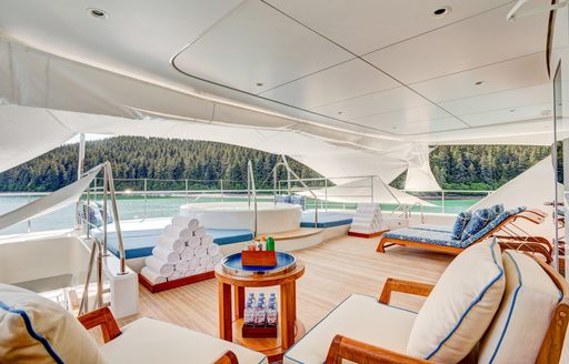 luxe upper deck aft with Jacuzzi and chaise loungers aboard luxury yacht ‘Party Girl’ 