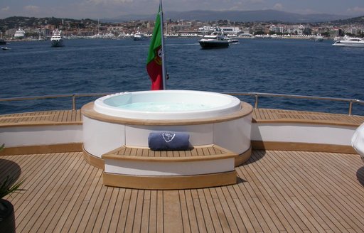 Jacuzzi on sun deck of charter yacht Costa Magna