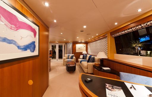 lounge and desk forms part of master suite on board luxury yacht SPIRIT 