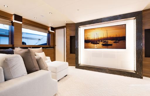 widescreen TV and seating area in main salon of luxury yacht ‘Silver Wind’ 