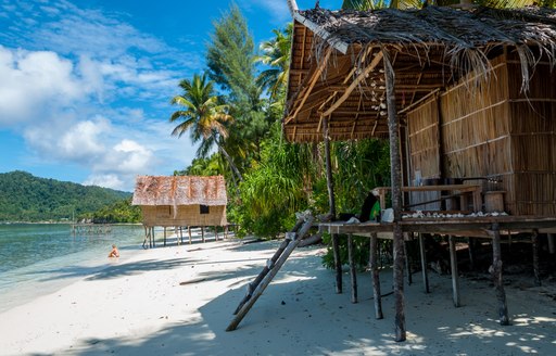 beach huts in papua new guinea