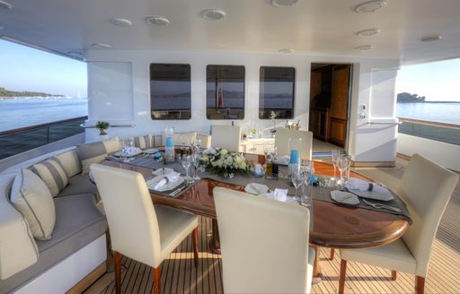 alfresco dining on aft deck of luxury yacht KANALOA 
