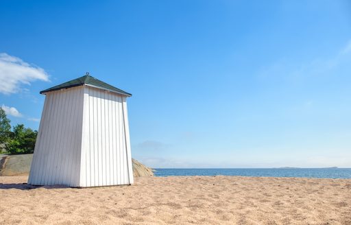 Lone beach hut on the sand at Hanko, Finland