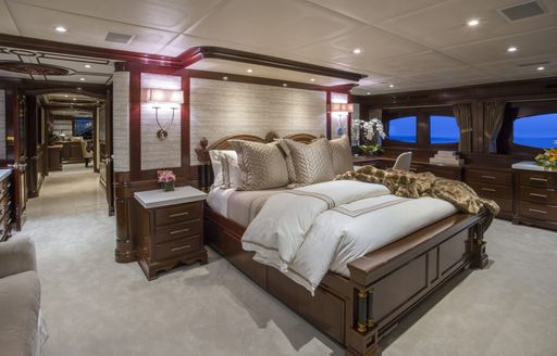 bed in master suite of luxury yacht Bacchus 